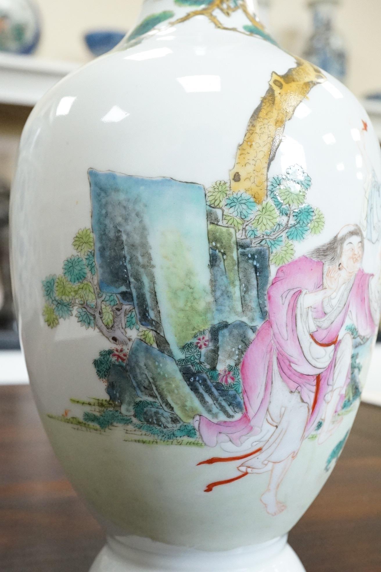 A Chinese famille rose ‘Liu Hai’ bottle vase, Qianlong six character seal mark but Republic period